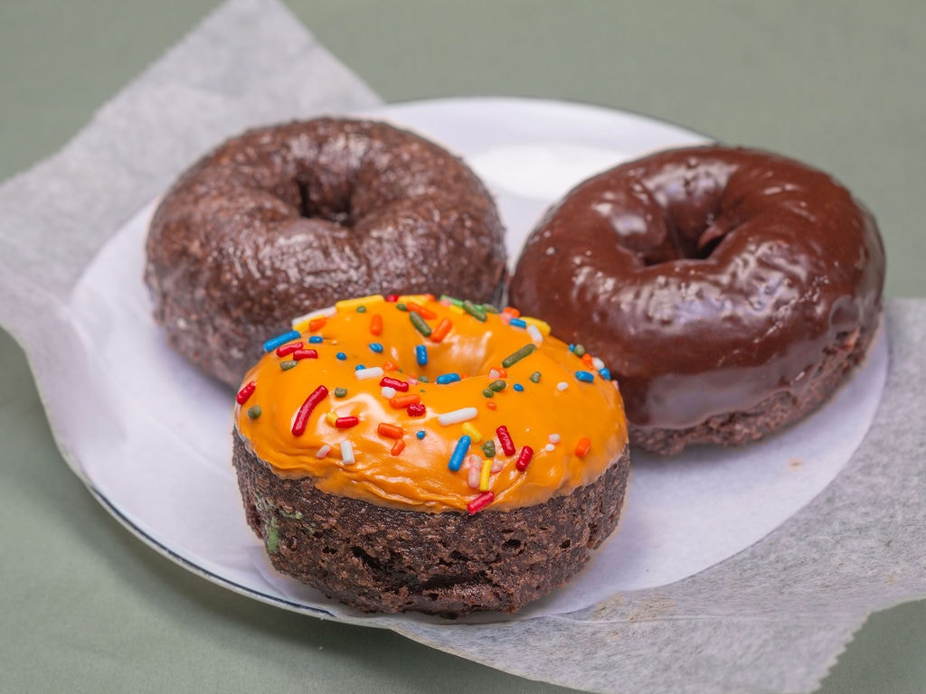 Chocolate cake donuts with sprinkles